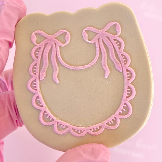 BABY BIB WITH BOWS - RAISED EMBOSSER